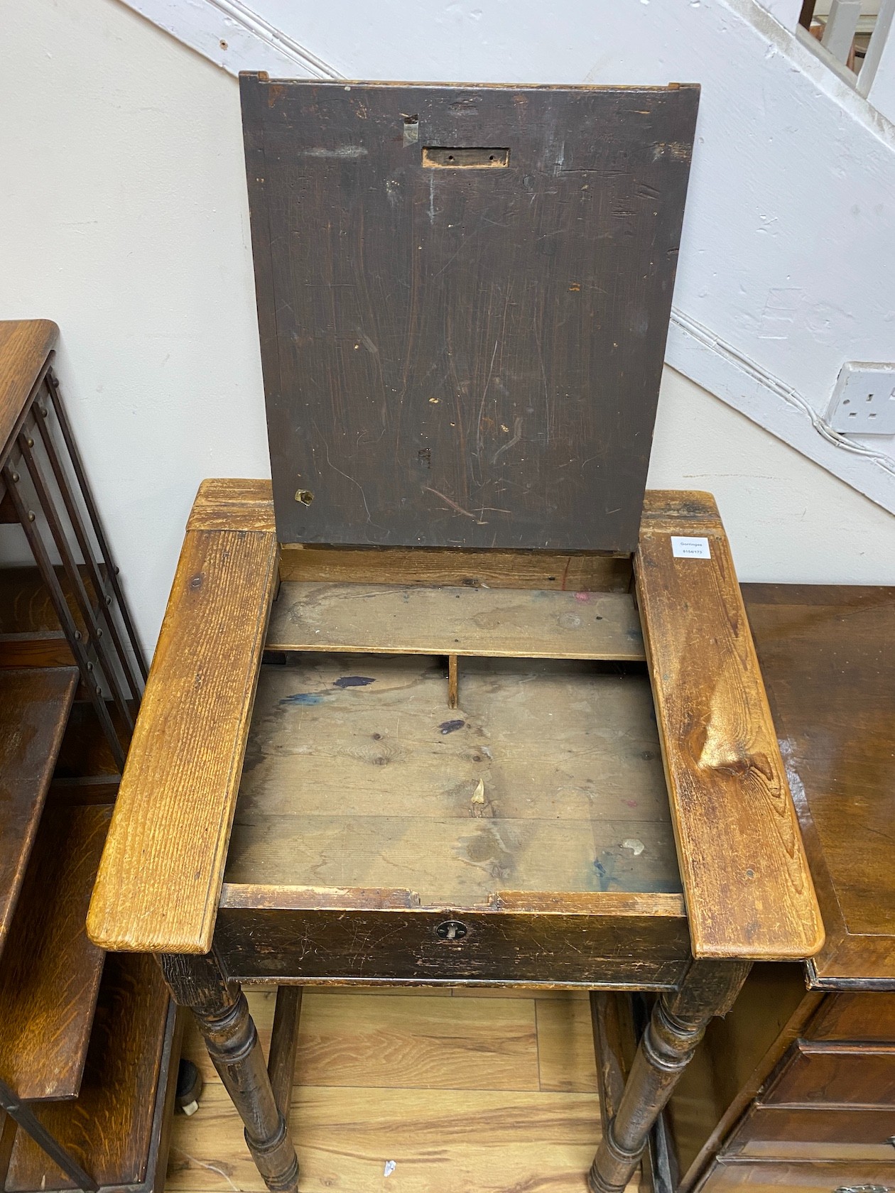 A Victorian pine clerk’s desk, width 61cm, depth 55cm, height 105cm